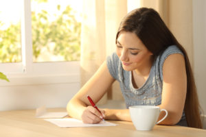 Woman studying free adoption tip sheet